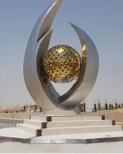 outdoor golden ball sculpture